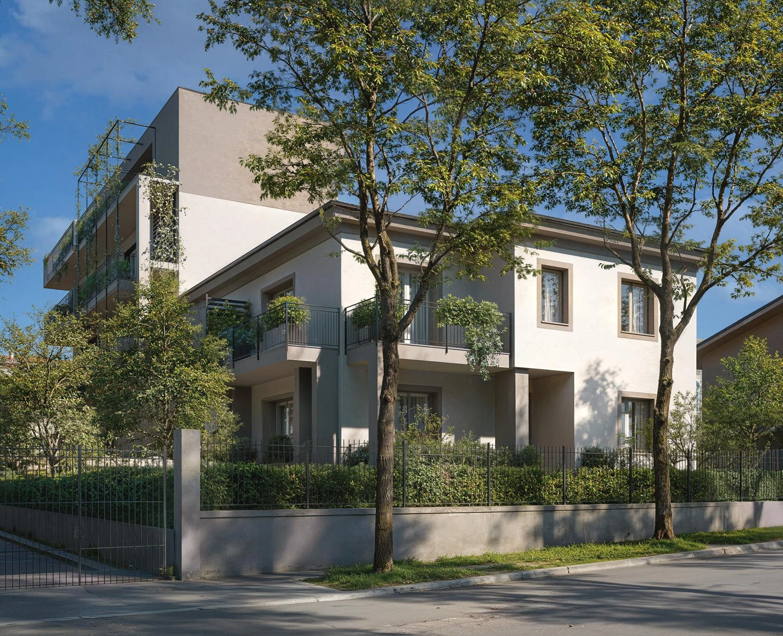 Buonarroti 4, Monza — Exterior view of the villa among trees